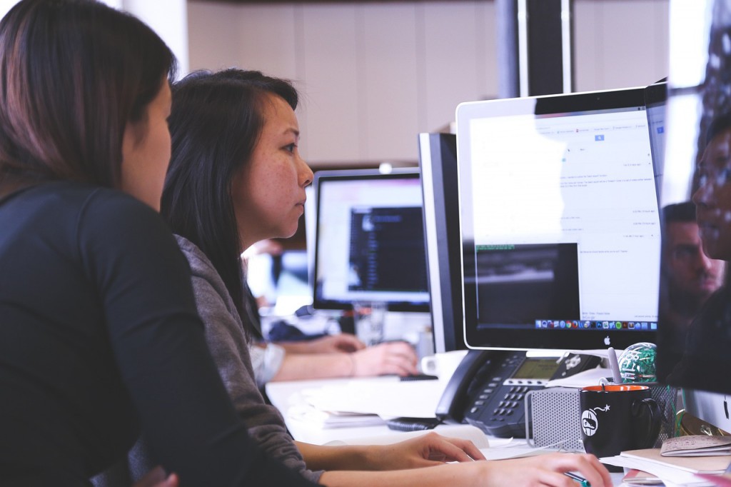Women working on computers.