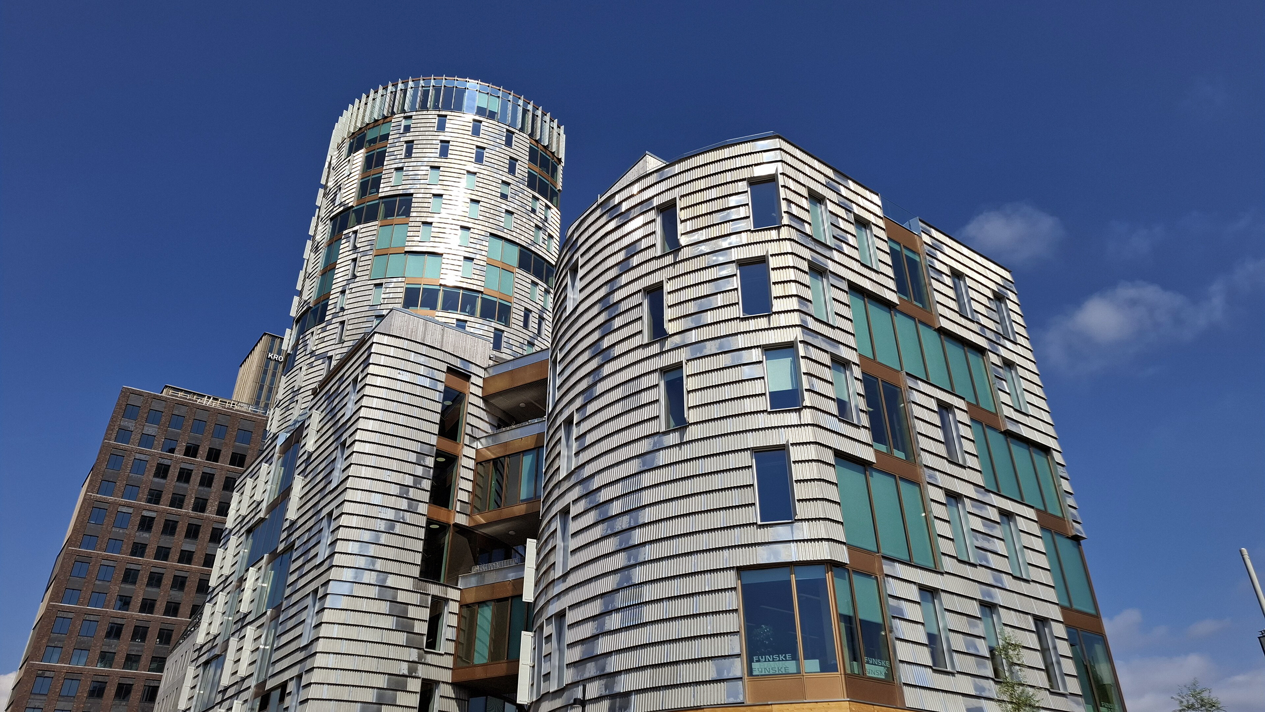 Record-breaking timber tower incorporates recycled wind turbine blades