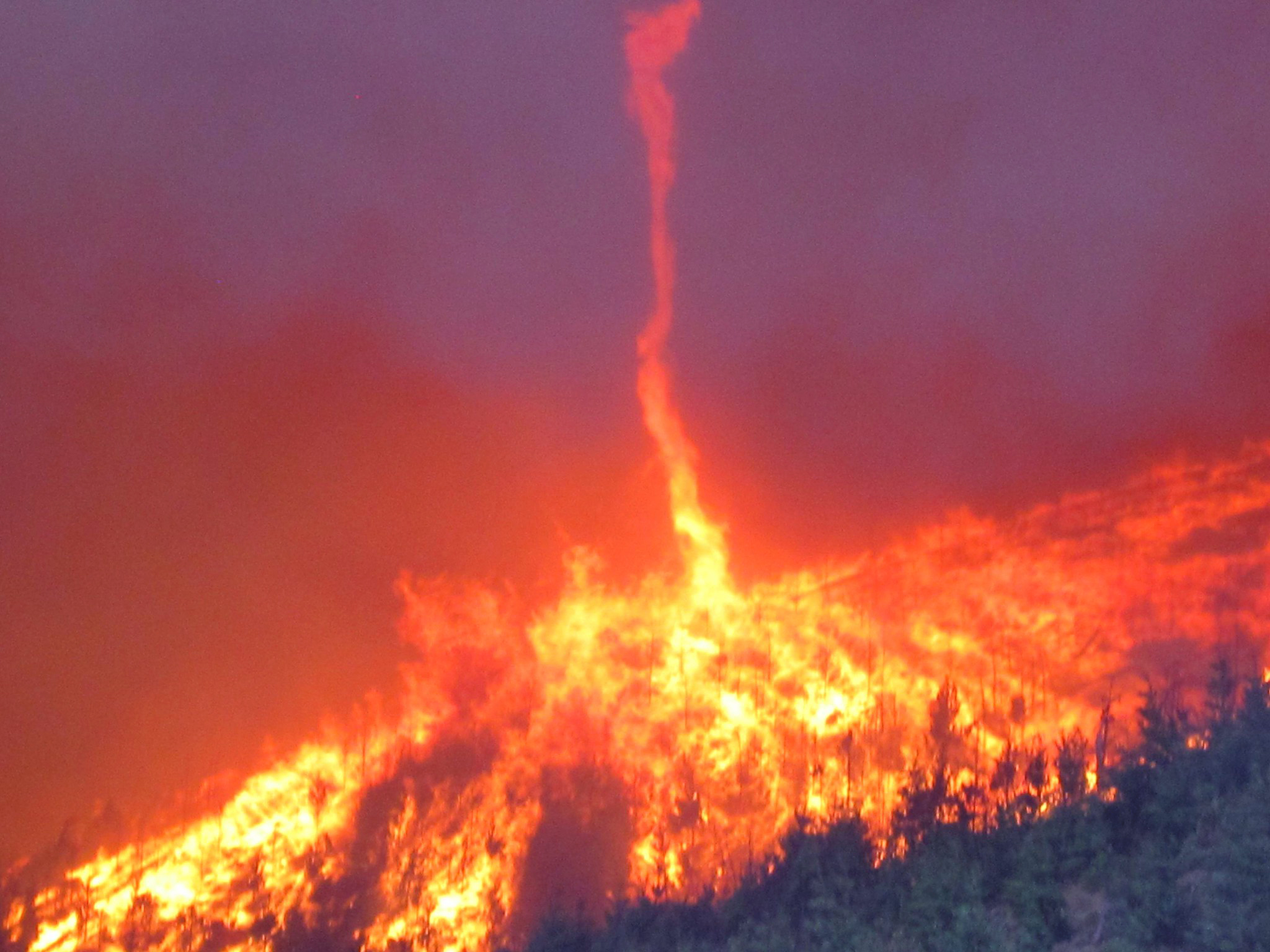 4 ways wildfires generate tornadoes, lightning and other extreme weather, sometimes miles from the flames