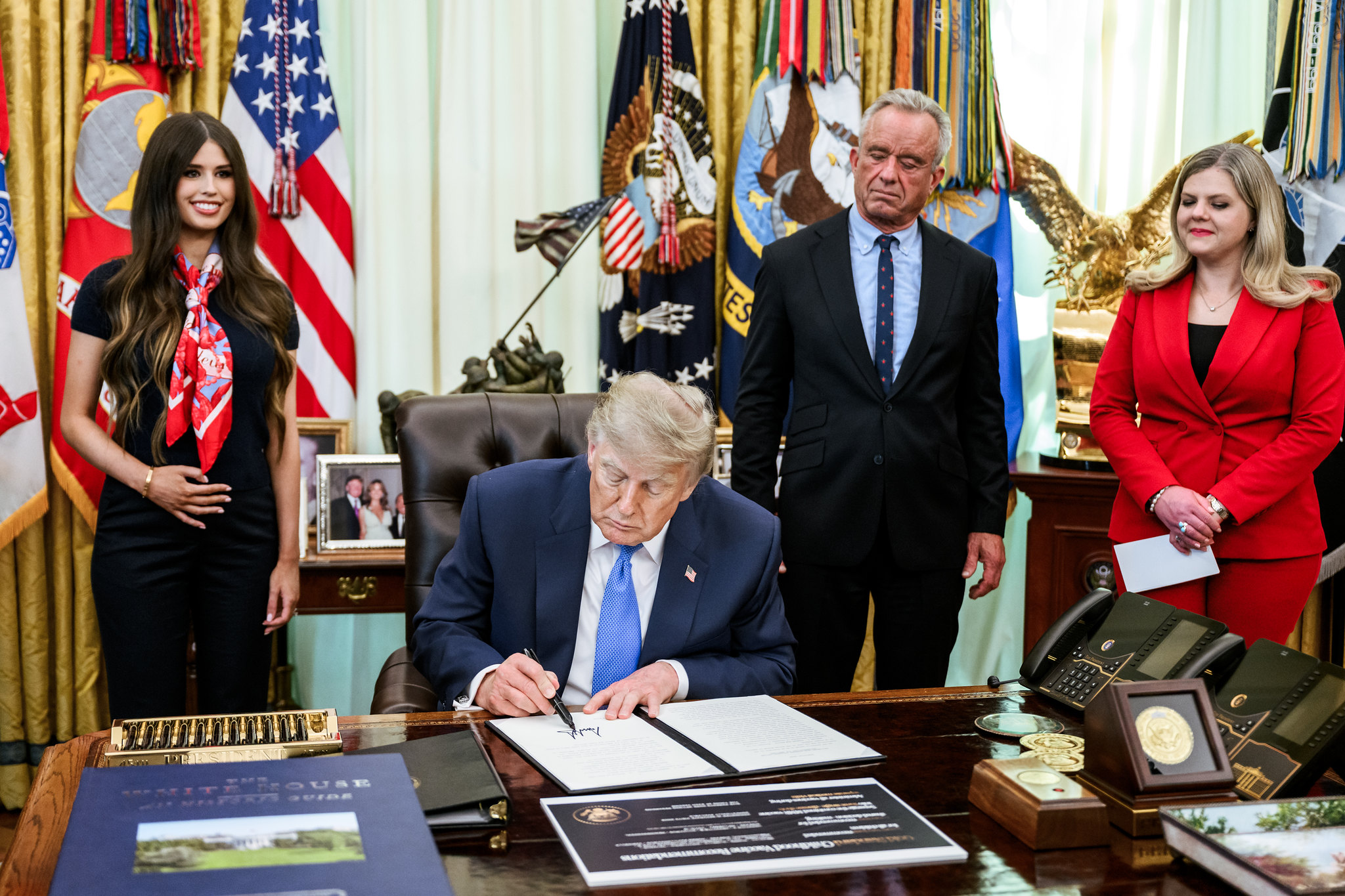 FACT FOCUS: Trump makes false claims as he signs order urging revisions around childhood vaccines
